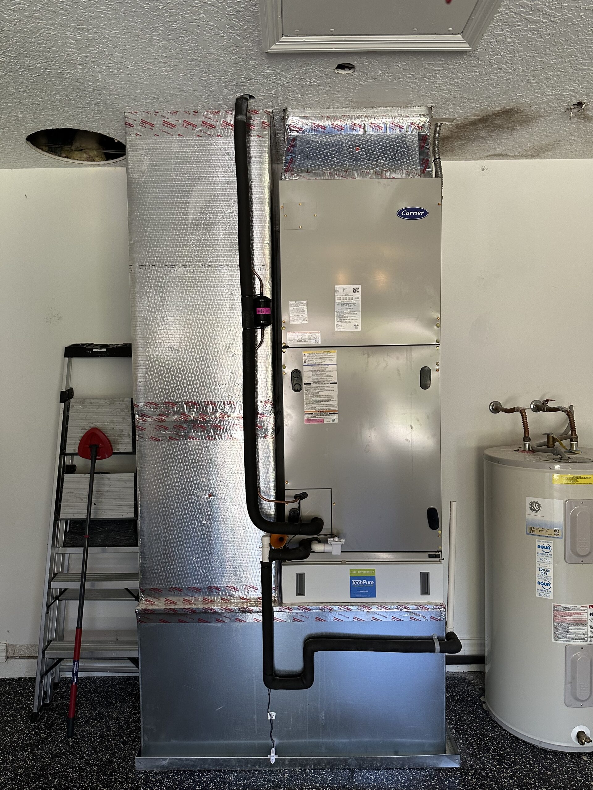 Insulated ductwork installed above framed doorway - Element Air Services